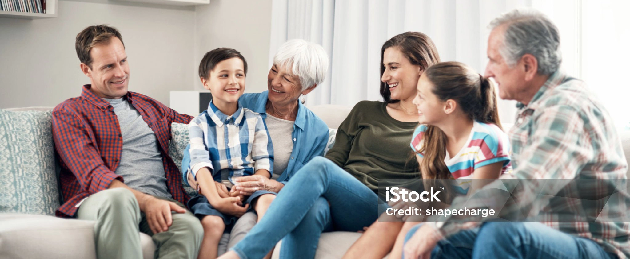 Family relaxing on couch